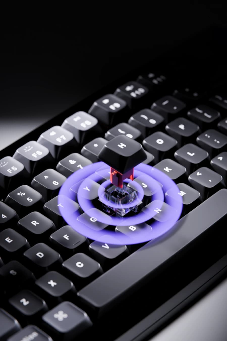 Mechanical keycap lifted out of a keyboard in a purple halo